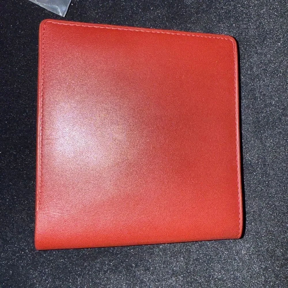 Never used Cartier red burgundy wallet comes with original box